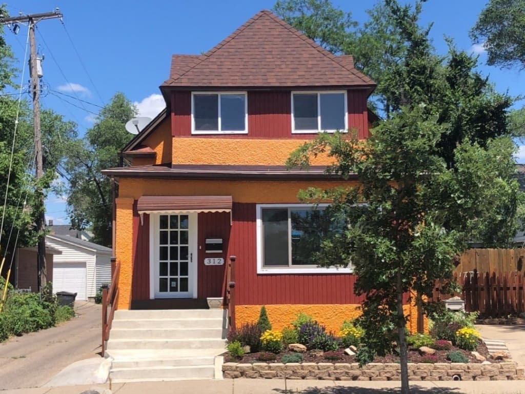 Orange Stucco & Maroon Trim