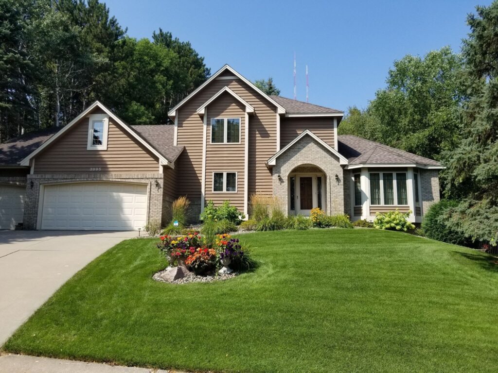 brown exterior house painting by professional house painters in Eagen, MN