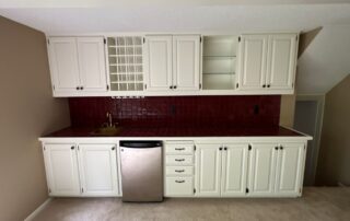 assessing cabinet condition before painting